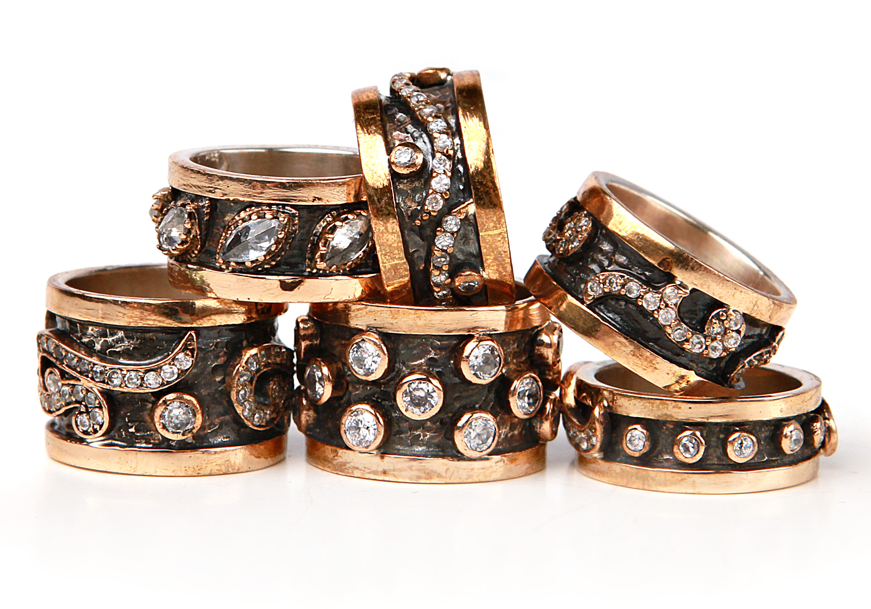 Oxidized silver band rings with crystals and gold
